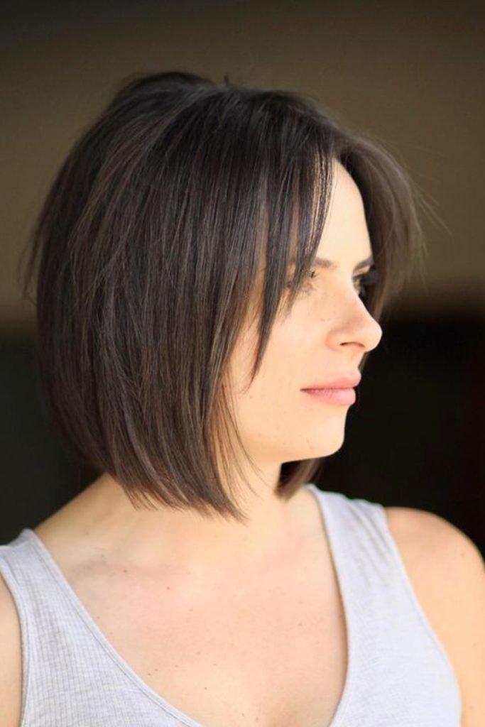 1. Layered Bob with Soft Fringes