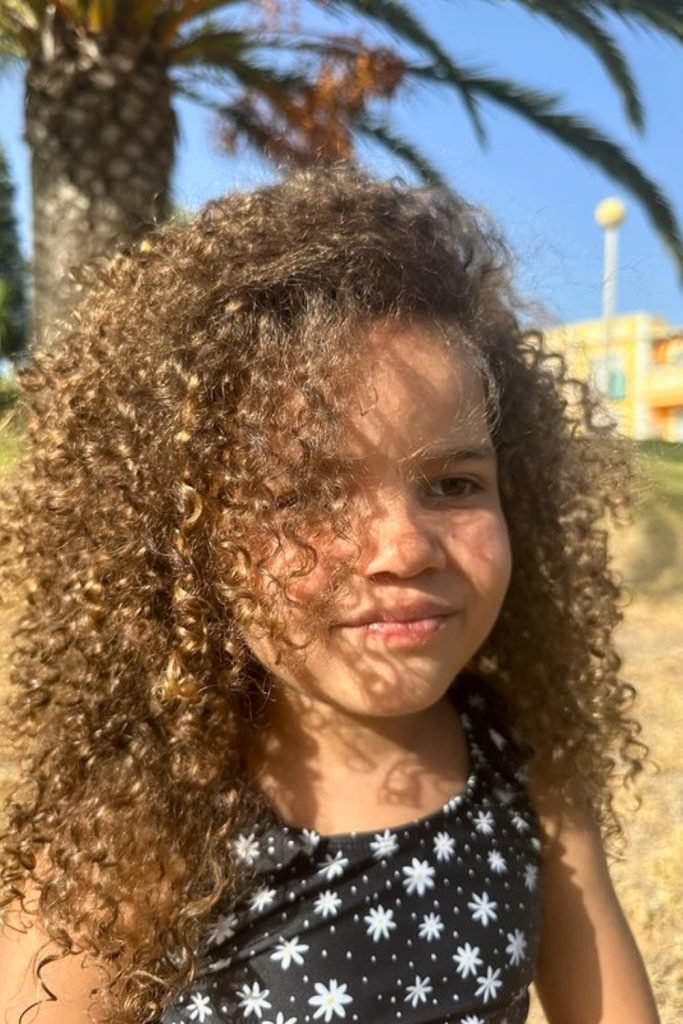 Sun-kissed curls with Floral Accents for Toddlers