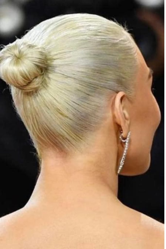 Blonde Hair in a Bun with Money Pieces
