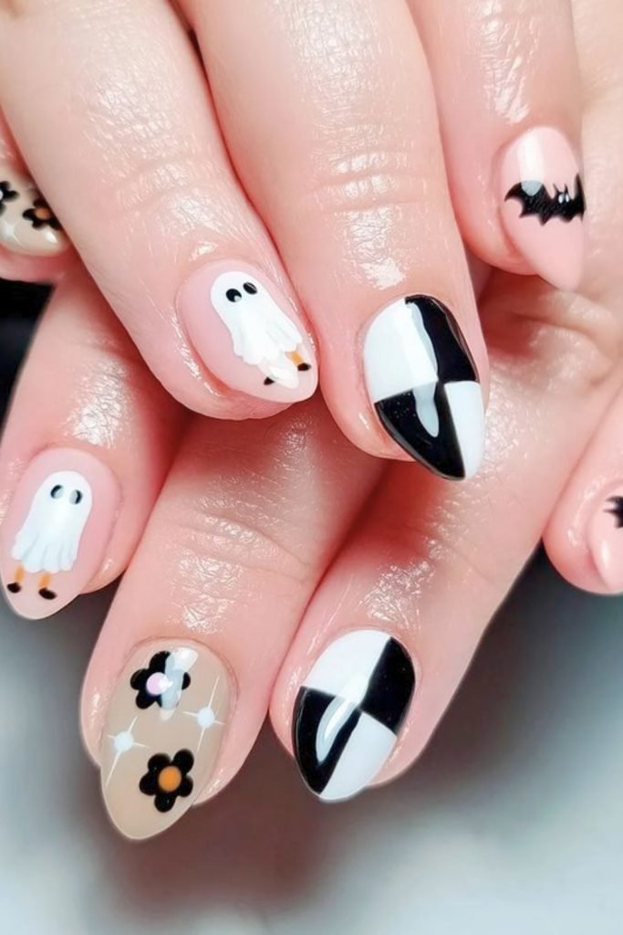 Playful Phantom Parade Halloween Nail Design