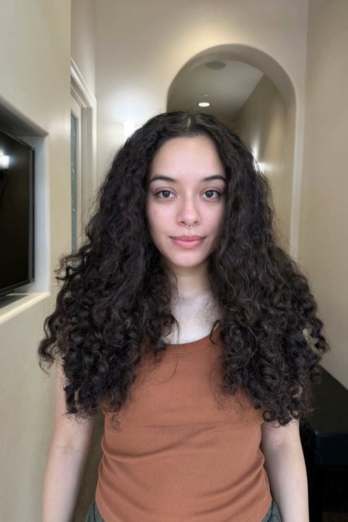 Effortless Center-Parted Curls with Subtle Layers