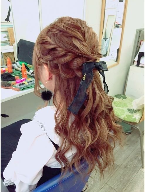 Waterfall Braid with a Bow Hairstyle