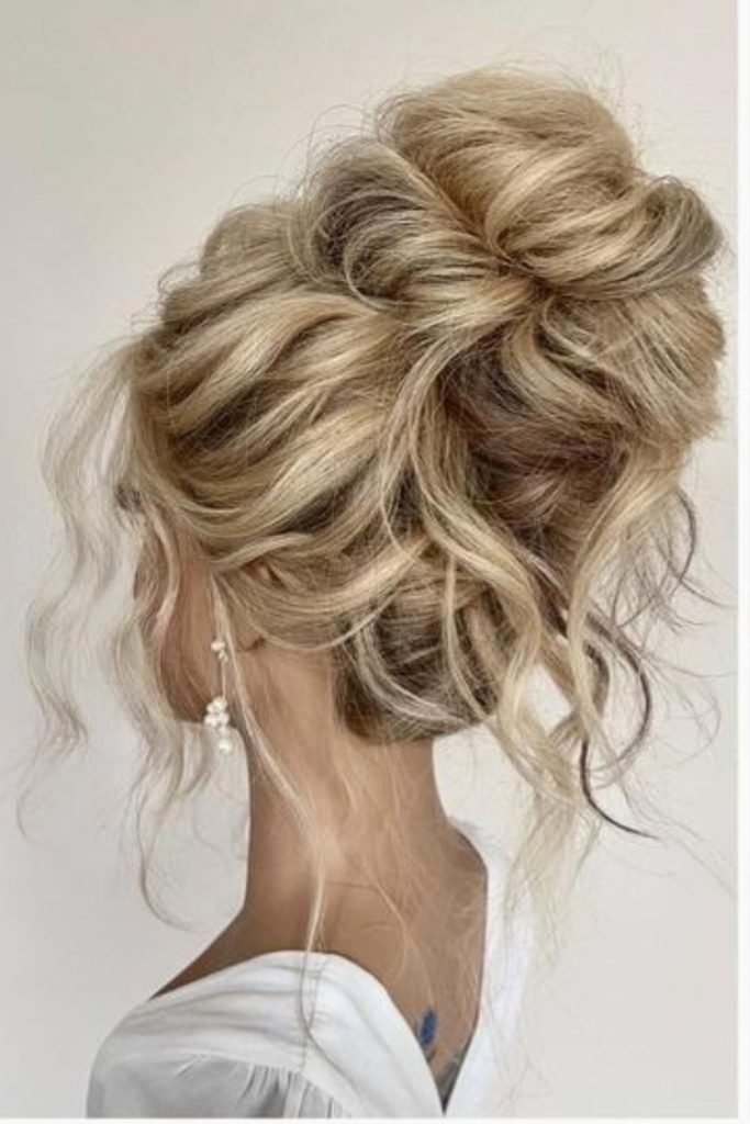 Effortless Textured Bun Hairstyle for Brides
