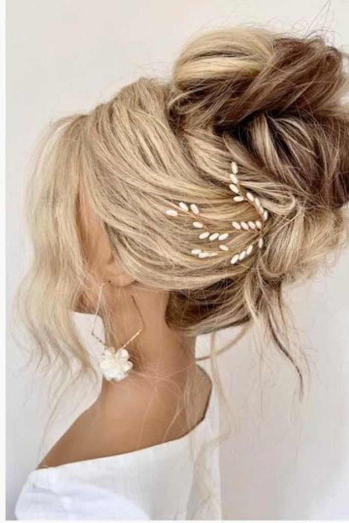 Elegant Twisted Updo with Leafy Pins