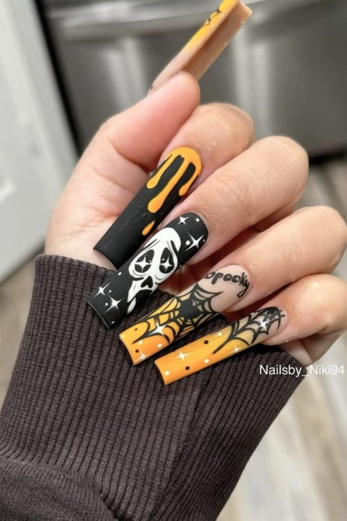 Midnight Masquerade Halloween Nail Design