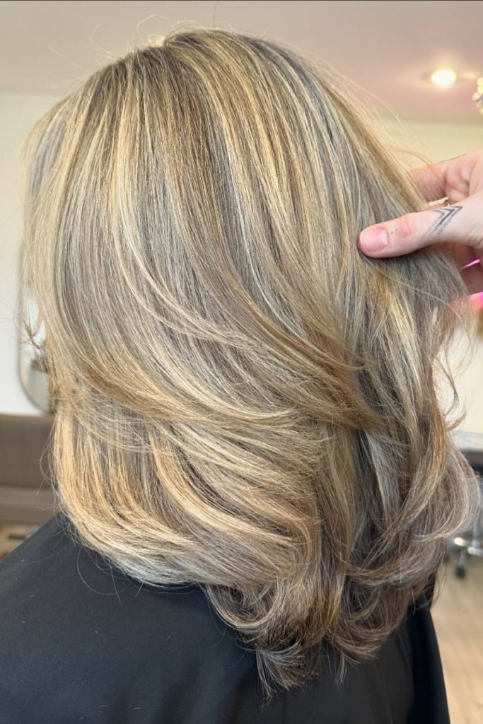 Blown-Out Layers - Modernized 1970s Hairstyle