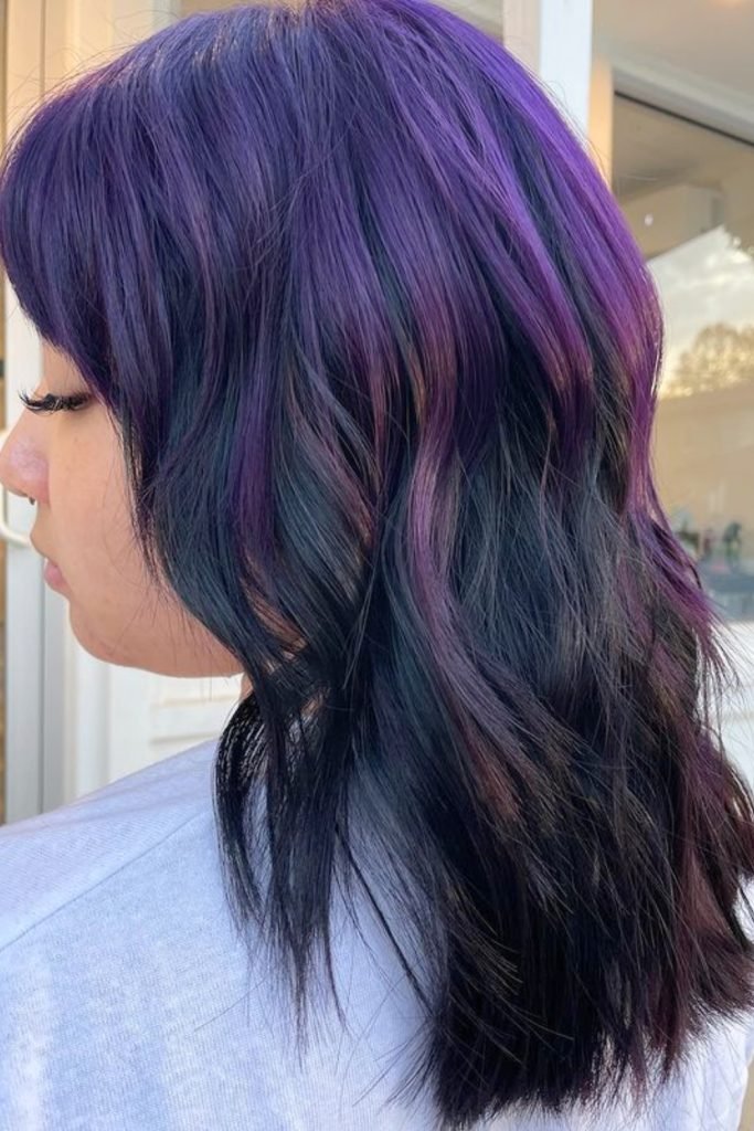 2. Vibrant Violets Wolf Cut Hairstyle