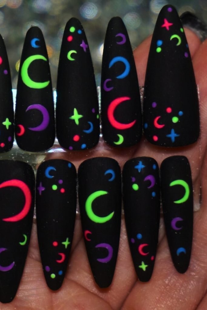 21. Cosmic Elegance Nail Design