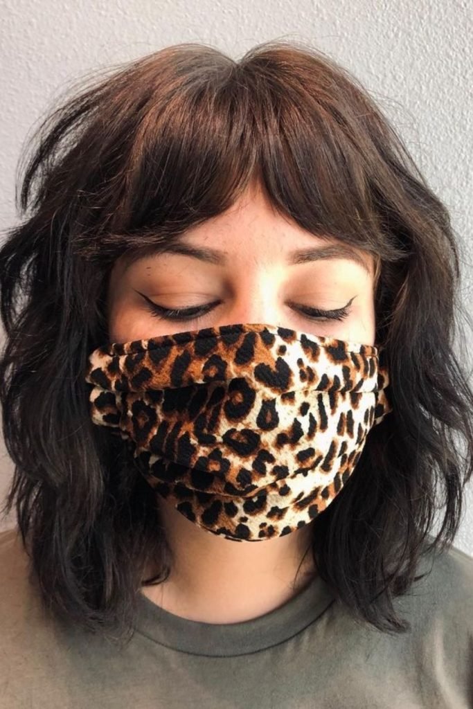 Curtain Bangs with a Low Maintenance Shag Hairstyle