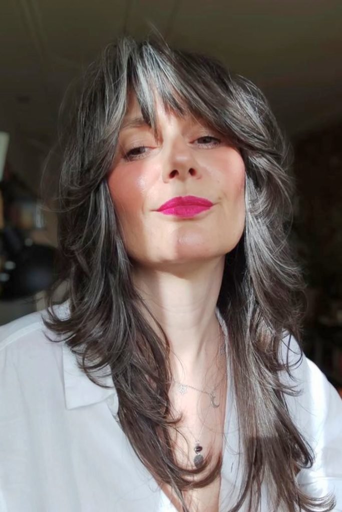 23. Voluminous Shag with Curtain Bangs