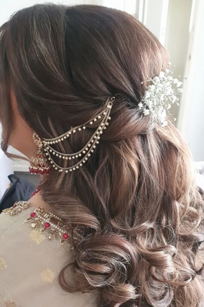 Elegant Floral Accent Hairstyle with Chain Embellishment