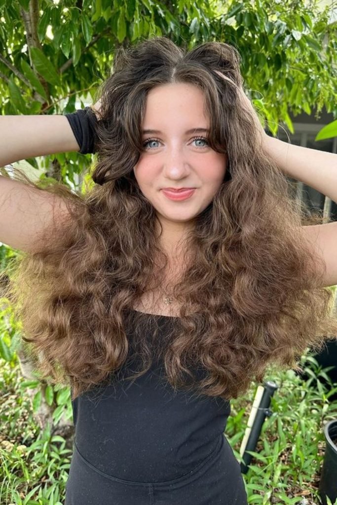 Voluminous Curls with Curtain Bangs