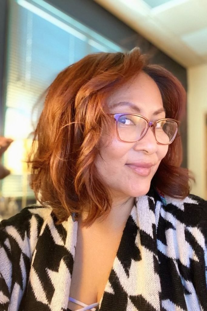 Auburn Cascade Hairstyle for Women Over 50