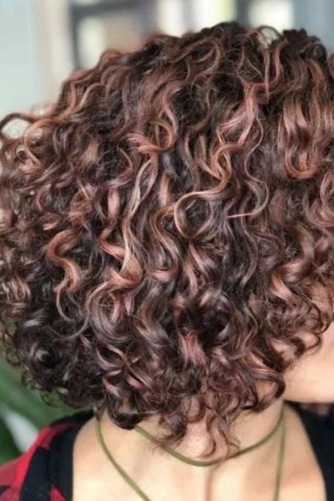 Short Perm with Caramel Highlights