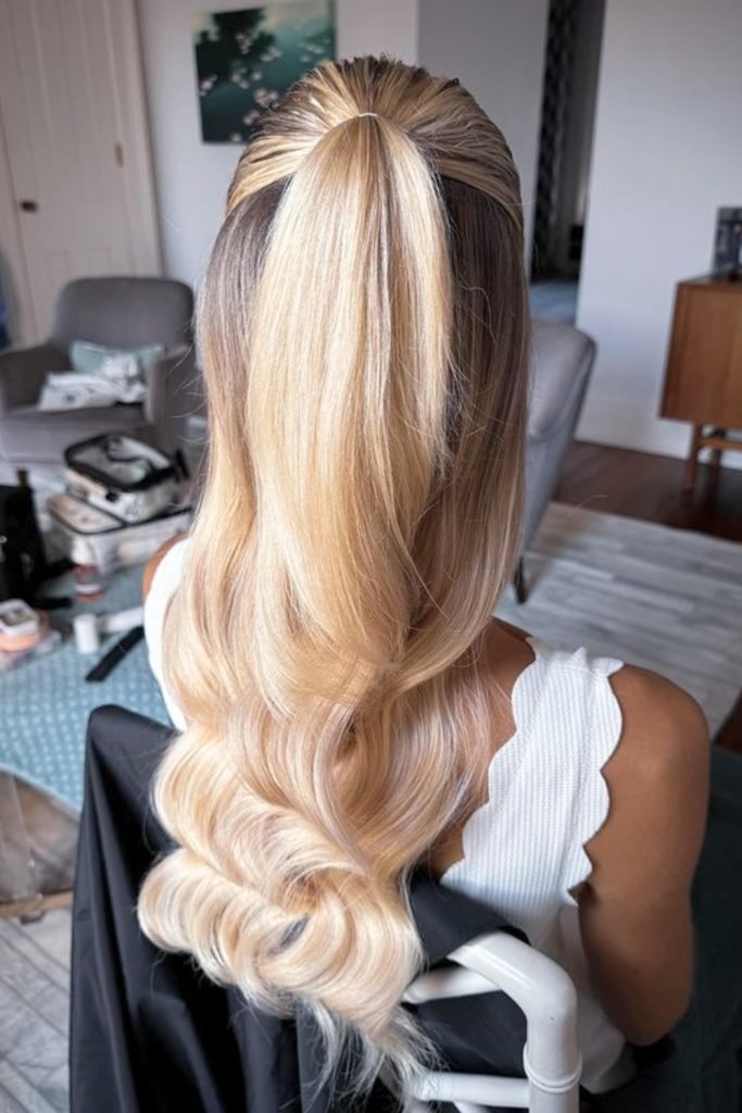 25. Sleek Half-Up Volume Waves Hairstyle