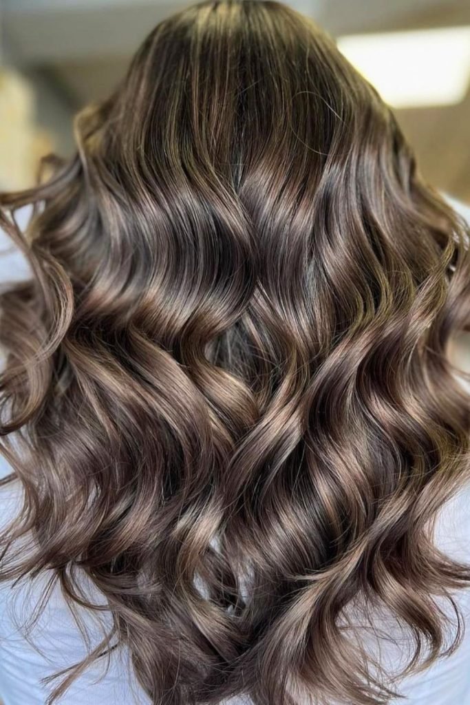 Glossy Caramel Curls for a Luxe Finish