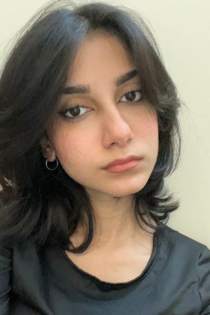 Layered Curtain Bangs with Soft Waves