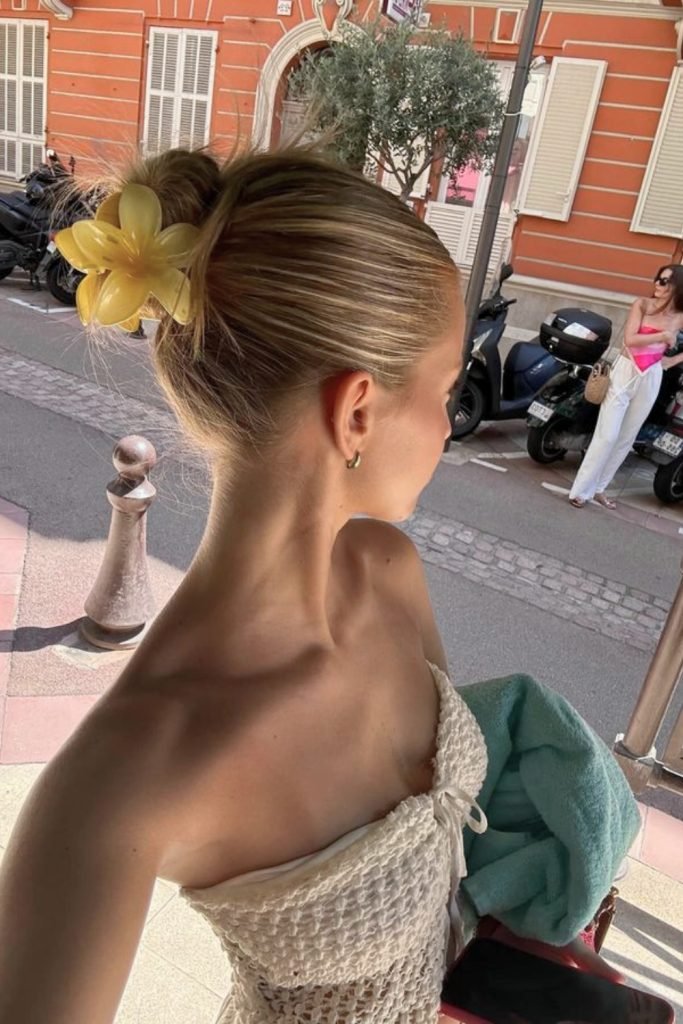 Sleek Bun with Floral Clip