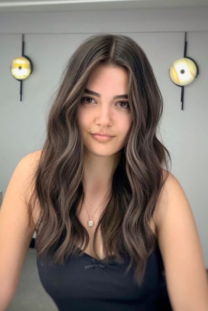 32. Sleek Ash Cascade Hair Style