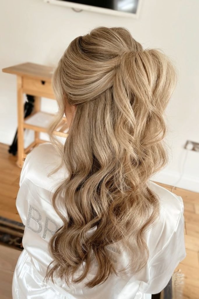 Soft Voluminous Waves with Half-Up Twist Hairstyle