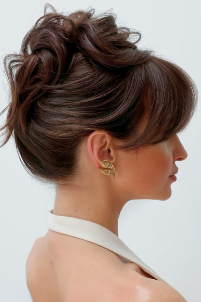 Voluminous Updo with Soft Bangs