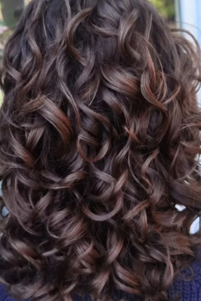Glossy Curls with Subtle Layers