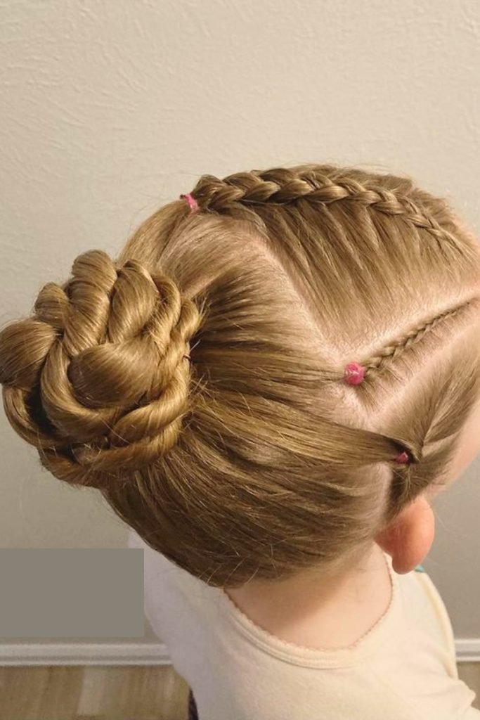 Intricate Braided Bun with Pink Accents