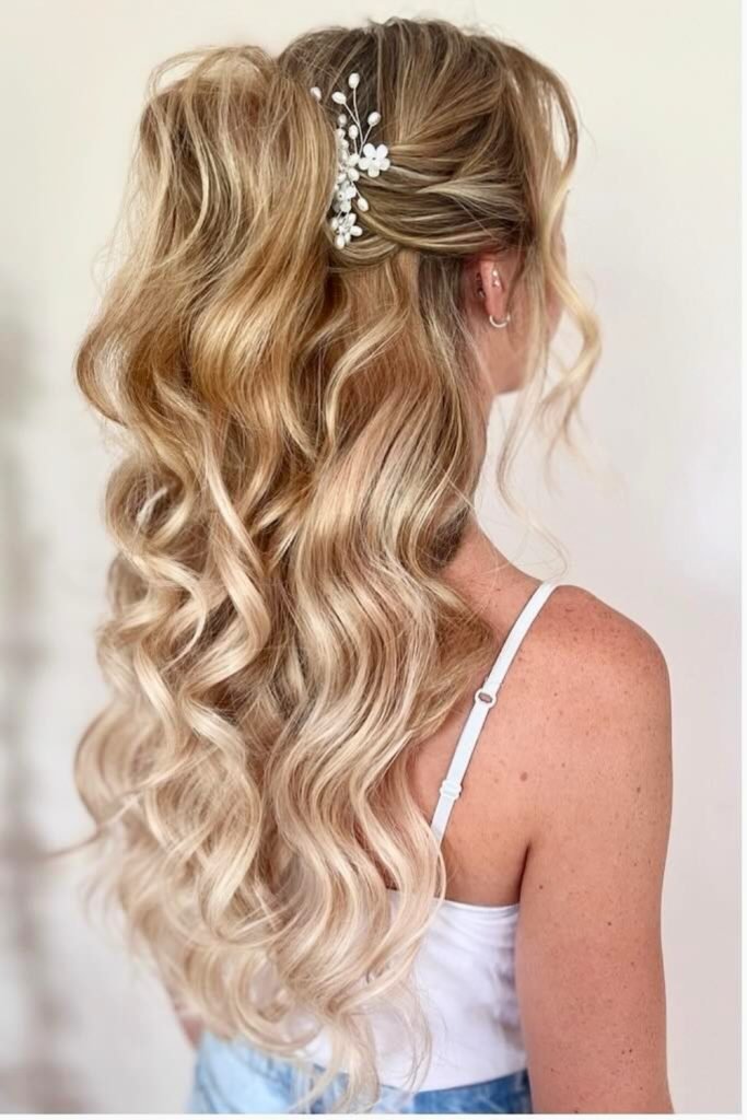 Voluminous Waves with Floral Accent Bridal Hairstyle