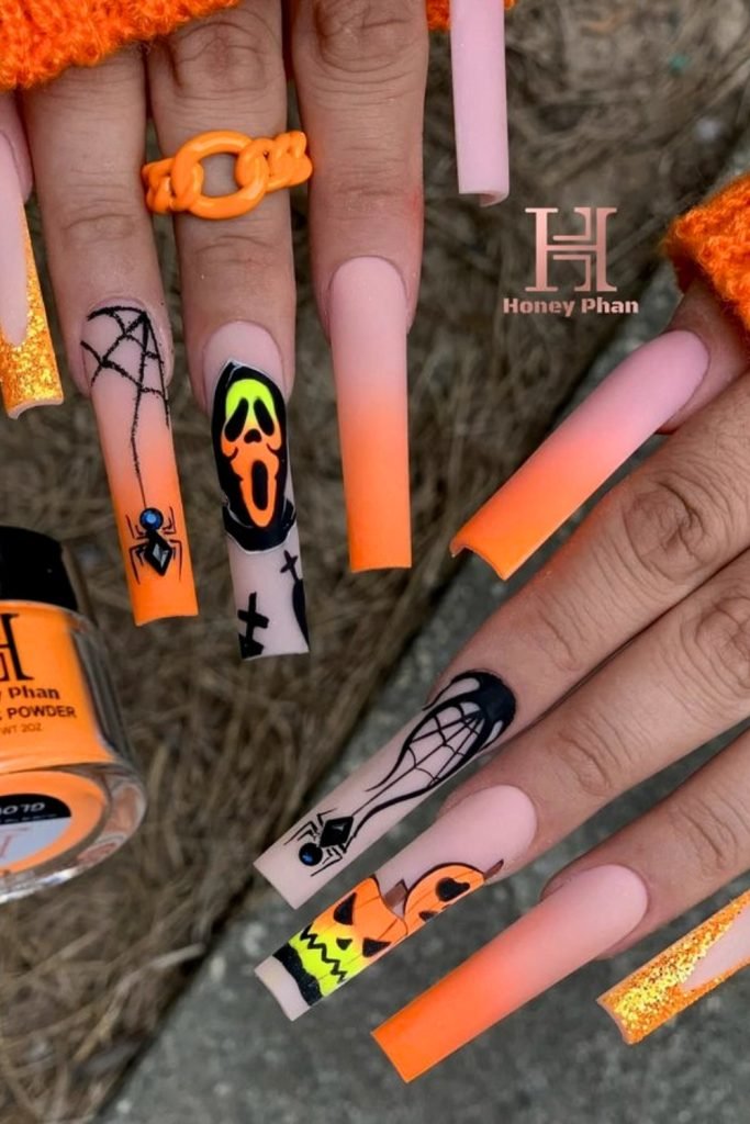 4. Frightful Flickers & Eerie Oranges Nail Designs
