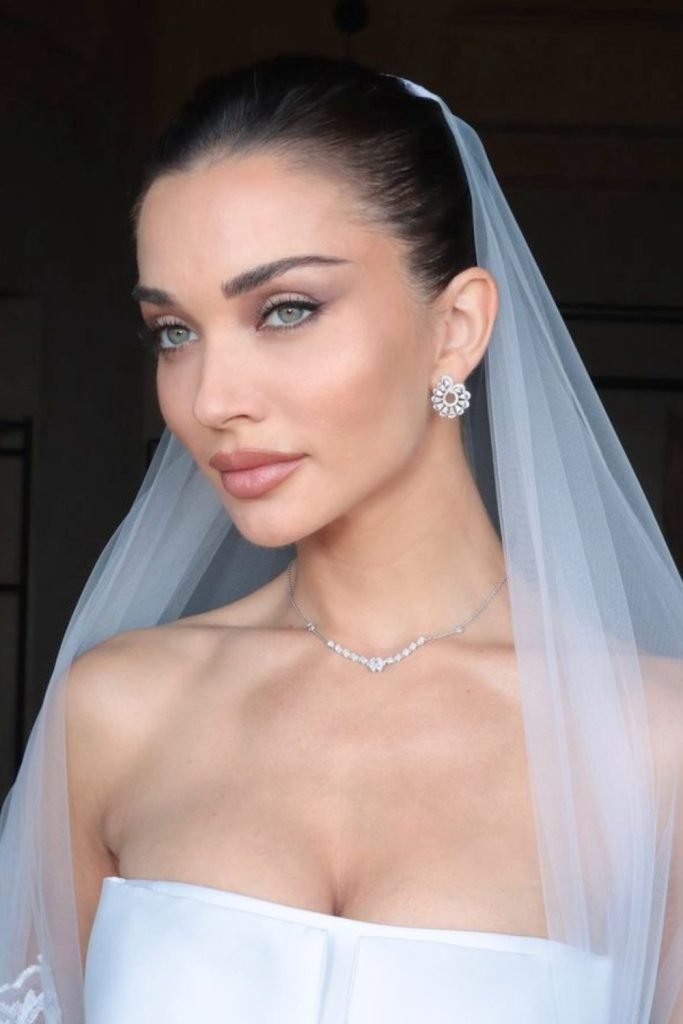 4. Sleek Veiled Updo