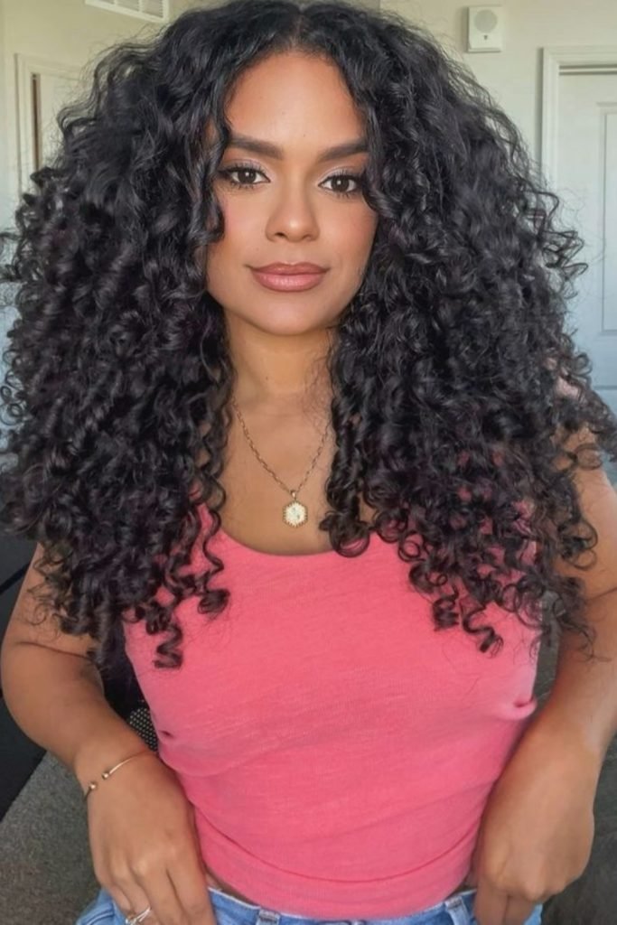 Voluminous Defined Curls with Layered Body