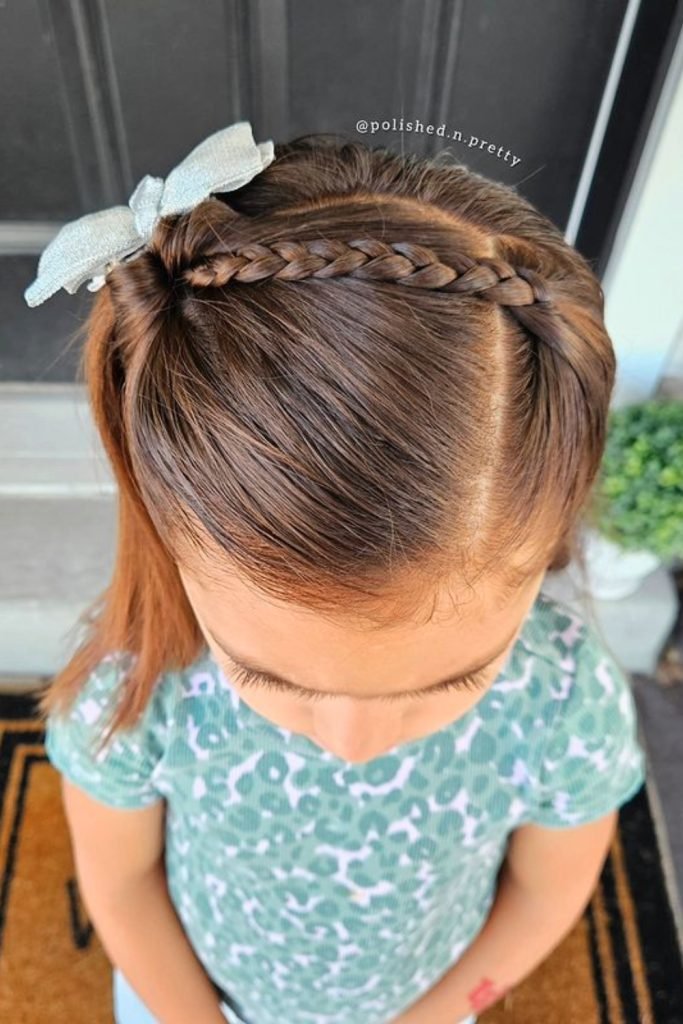 7. Side Braid with Bow Accent
