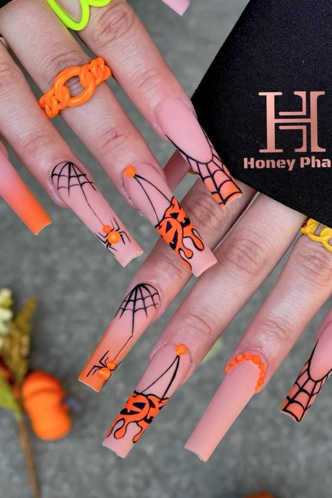 Spooky Silhouettes & Whimsical Webs Nail Design