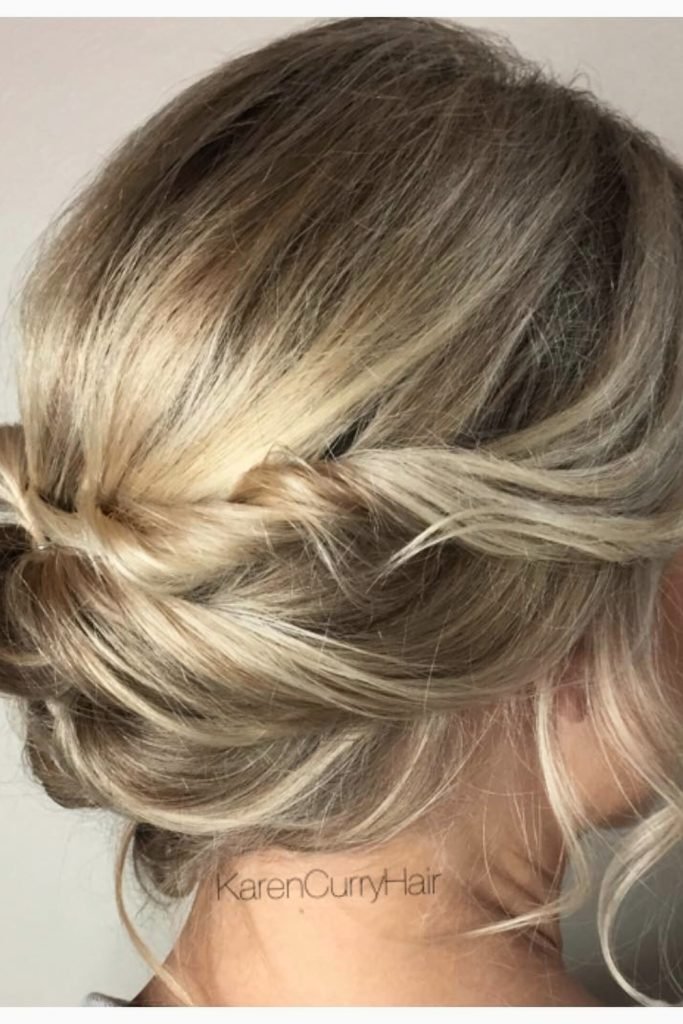 Twisted Low Bun with Soft Waves Hairstyle