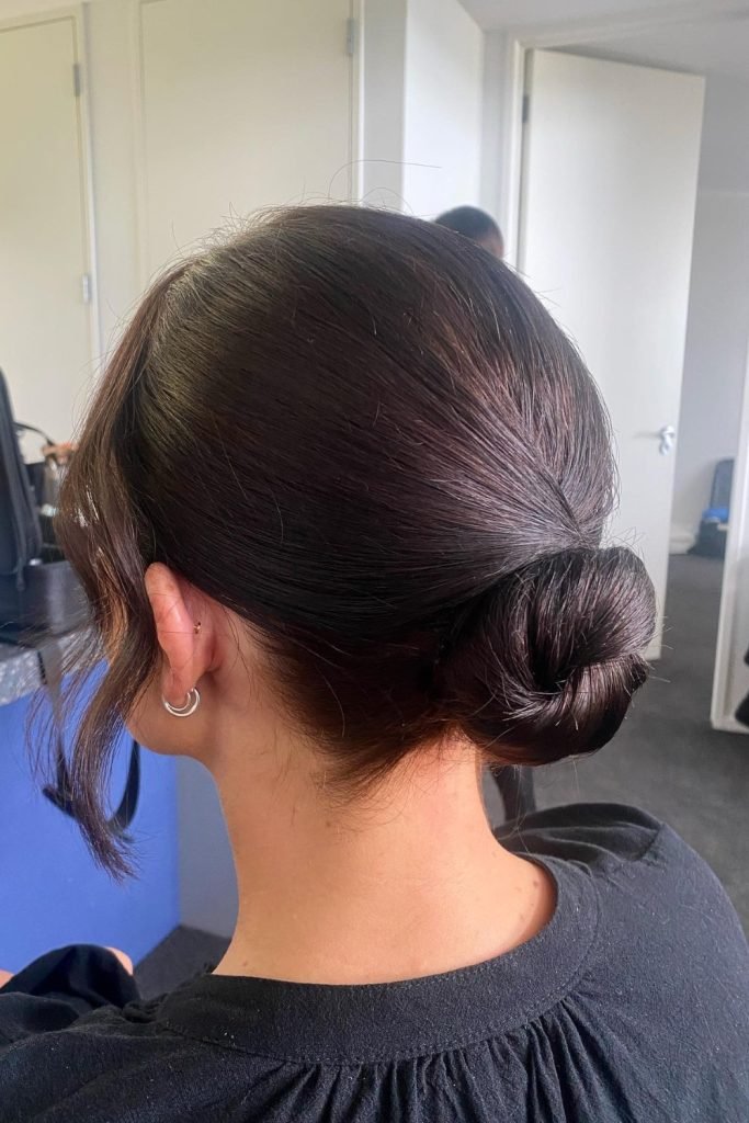 Sleek Back Bun with Flicks Hairstyle