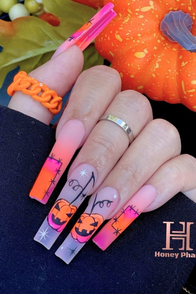 Twilight Glow & Pumpkin Charm Halloween Nail Design